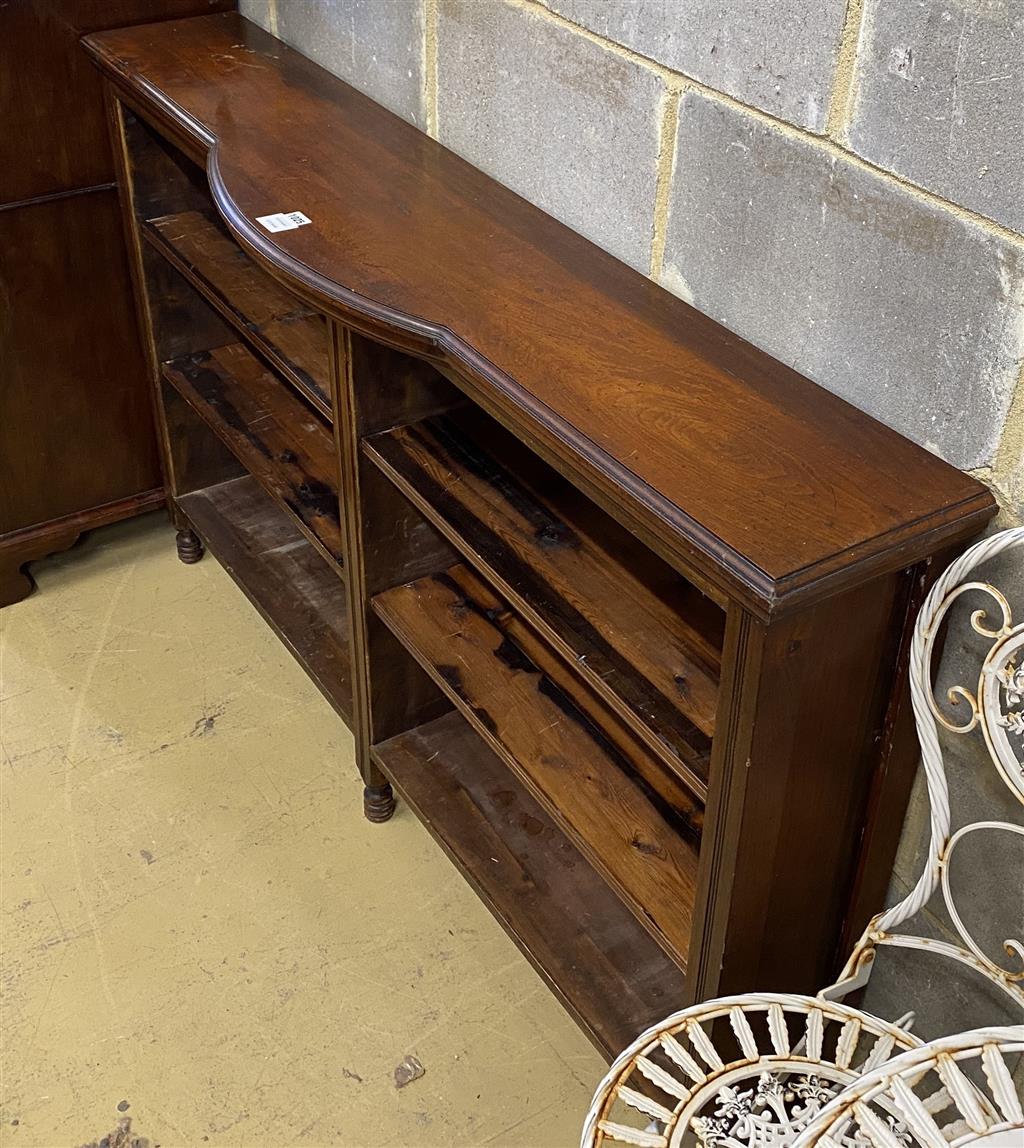 A Victorian mahogany open shelved bookcase, with bowfront centre section, length 150cm, height 94cm